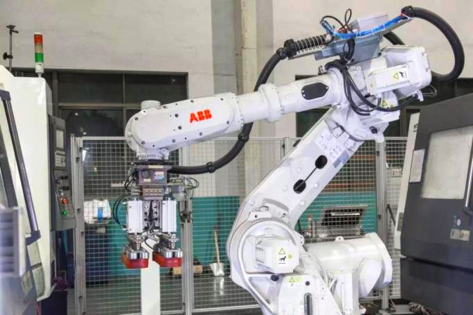 Robot machine tending
